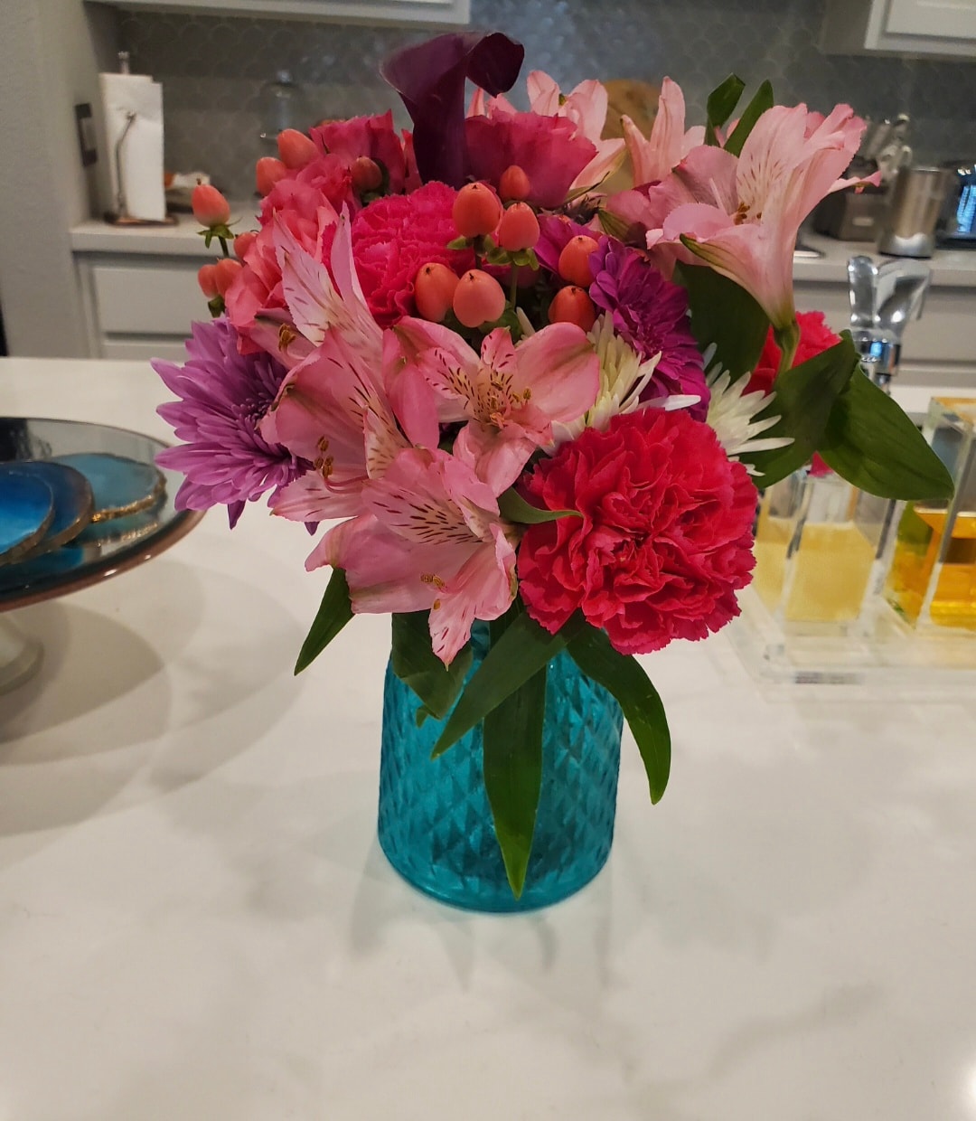 Elegant white orchid arrangement by Myra Blooms